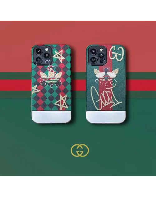 Adidas アディダス Gucci グッチ コラボ ブランド iphone 14/14 pro/14 pro maxケース 芸能人 メッキ風  蜂蛇柄 モノグラム トレフォイル 五芒星 ジャケット型 アイフォン14/13/12/11カバー 大人気 メンズ レディーズ