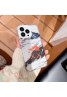 KAWS THE NORTH FACE コラボ iphone 14/14 pro/14 pro maxケース モノグラム クリア カウズ ザ.ノース.フェイス 透明 雪山柄 ジャケット型 アイフォン14/13/12/11カバー セレブ愛用 メンズ レディース