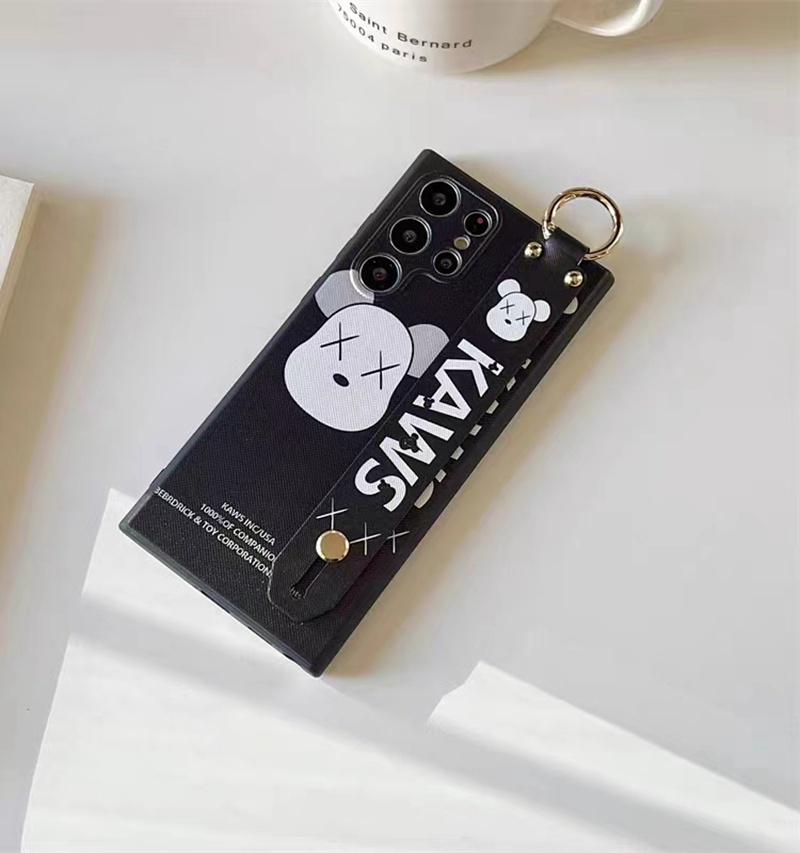 カウズkaws galaxy s23+ultraケース バンド熊ジャケット リング スタンド モノグラム ハイブランド 落下防止 ギャラクシーs23プラス/s23ウルトラ