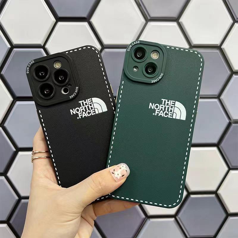 the north face ブランド iphone14/14 pro/14 pro maxケース ザノースフェイス 雪山 ジャケット型 モノグラム 落下防止